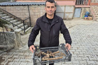 Eğirdir Gölü'nün suyu çekilen kıyı kesiminde insan kemikleri bulunan küpler ortaya çıktı