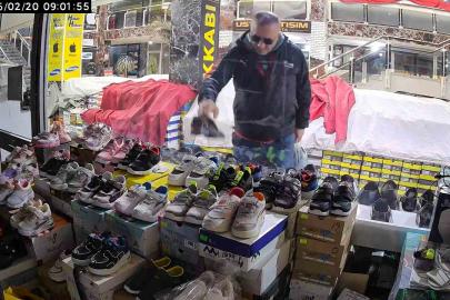 Önce beğendi ardından poşete koyup çaldı